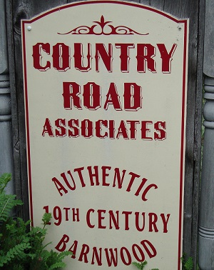Country Road Associates Sign